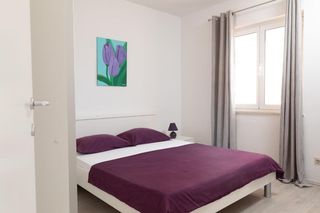 Posteľ alebo postele v izbe v ubytovaní Apartment Mirna