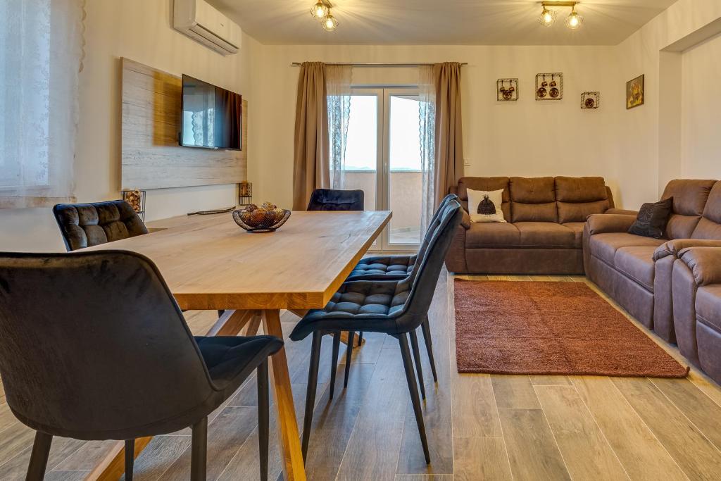 Posezení v ubytování Oliva Vallis Apartments