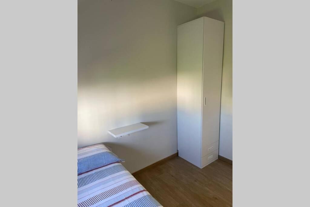 Postel nebo postele na pokoji v ubytování La Juli, Exclusivo chalet nuevo, de lujo