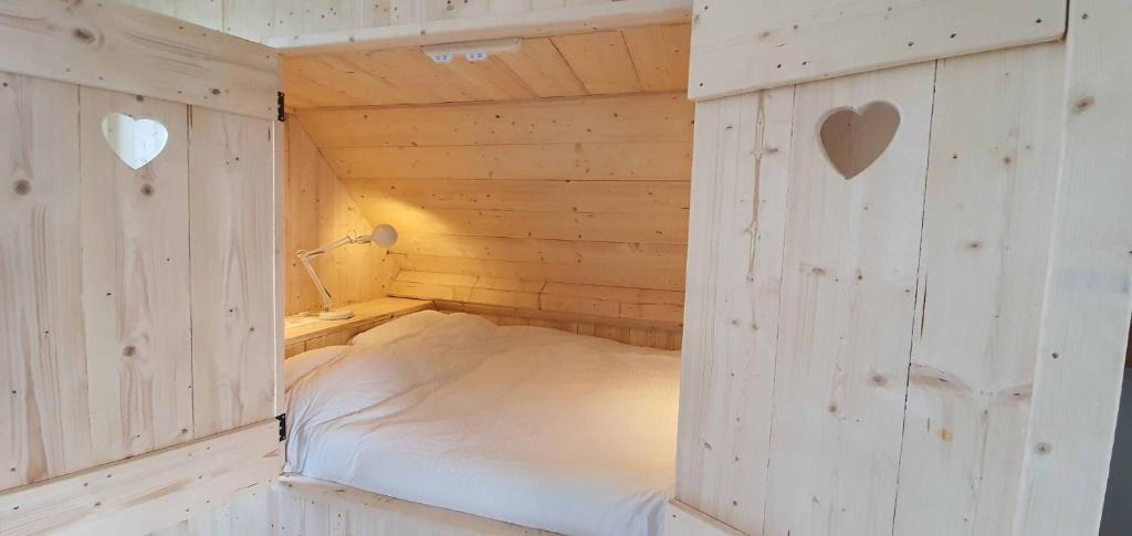 Postel nebo postele na pokoji v ubytování Het Kleine Paradijs