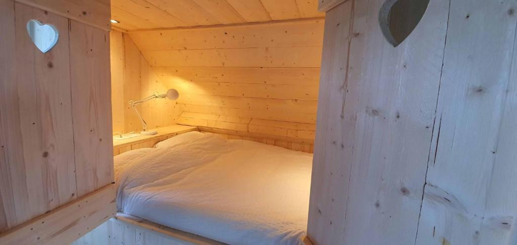 Postel nebo postele na pokoji v ubytování Het Kleine Paradijs