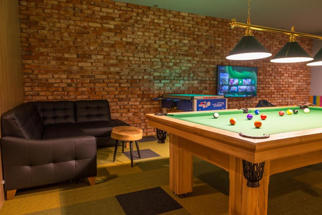Biliár nebo kulečník v ubytování Baltic Time - domki z jacuzzi i saunami