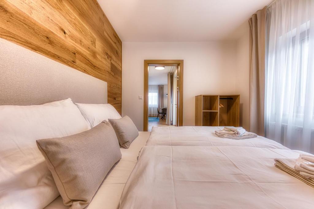 Voodi või voodid majutusasutuse Apartmány Filipovice toas