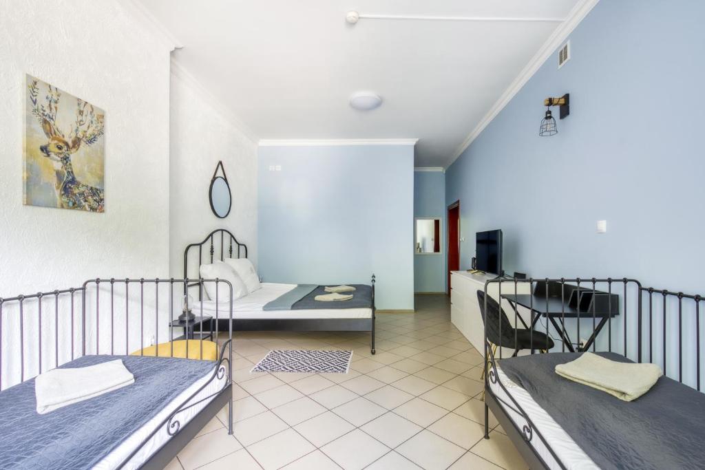 Postel nebo postele na pokoji v ubytování Hostel Krokodyl-Stara Praga