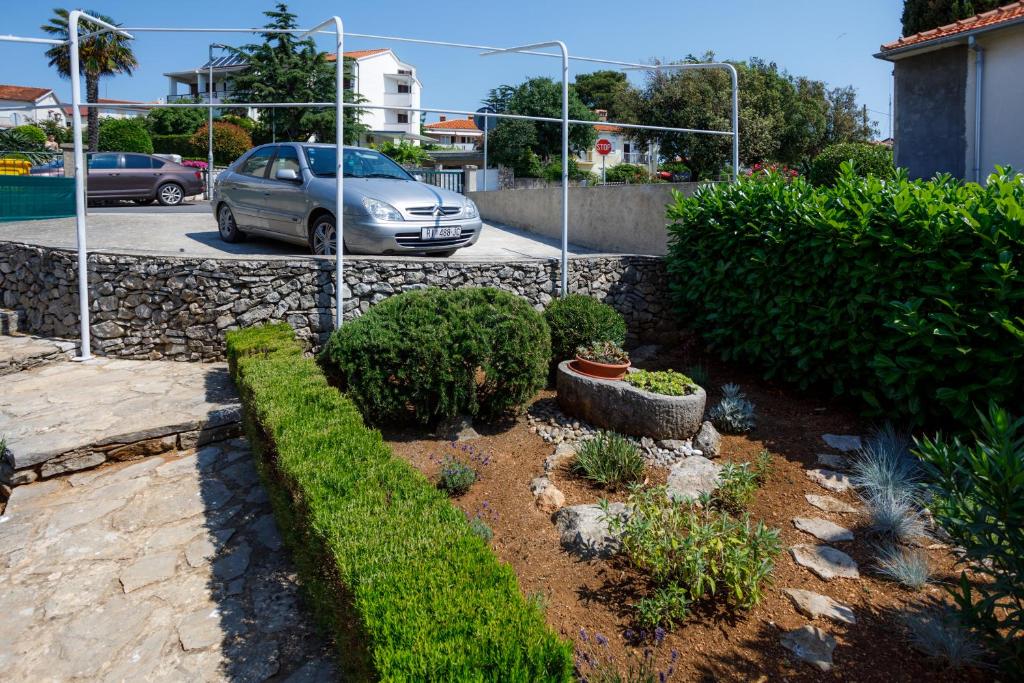 Vonkajšia záhrada v ubytovaní Apartment Franolic