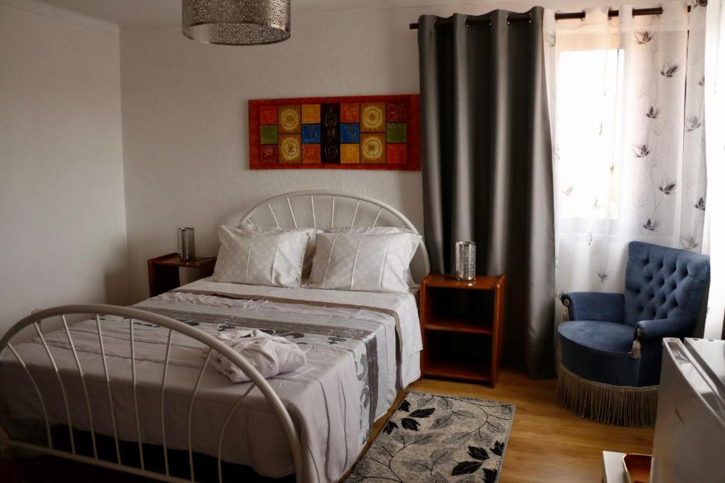 Postel nebo postele na pokoji v ubytování Casa Teresinha