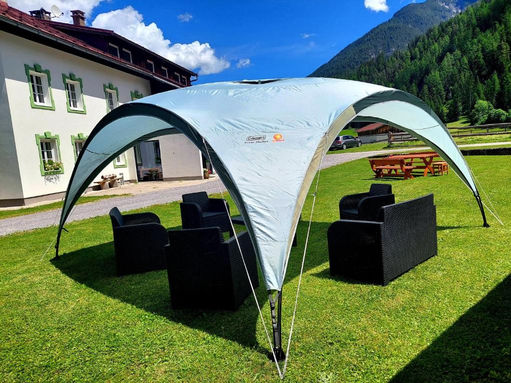 Zahrada ubytování De Nussi's Chalet 1