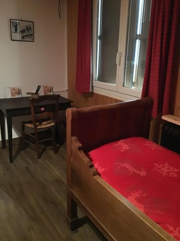 Postel nebo postele na pokoji v ubytování hôtel le tremplin