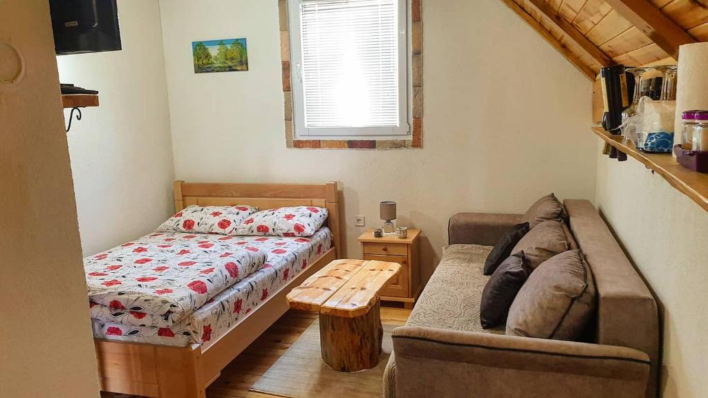 Voodi või voodid majutusasutuse Durmitorski konaci apartments toas