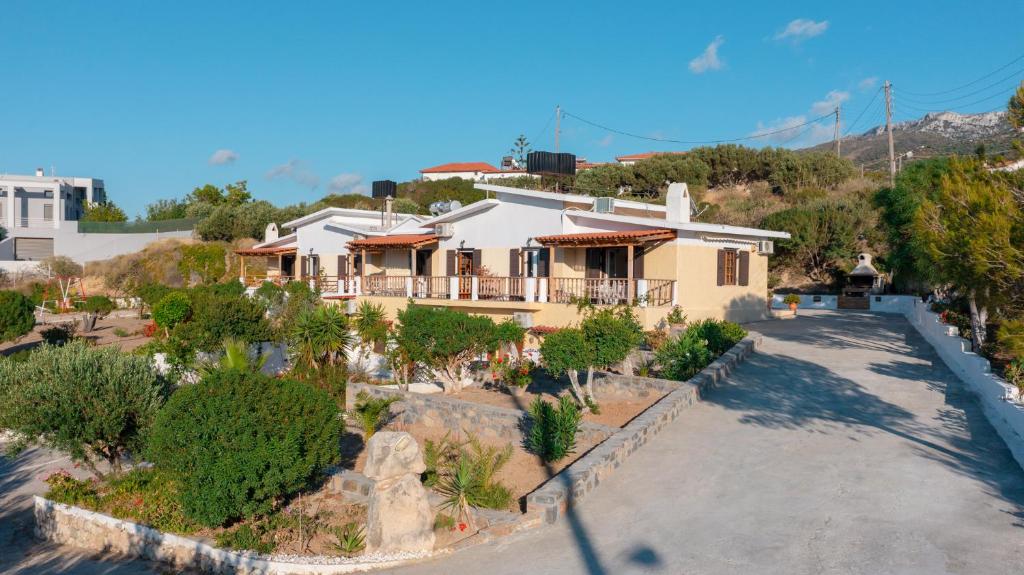 an aerial view of a house with a driveway at Romanza Villas in Sitia