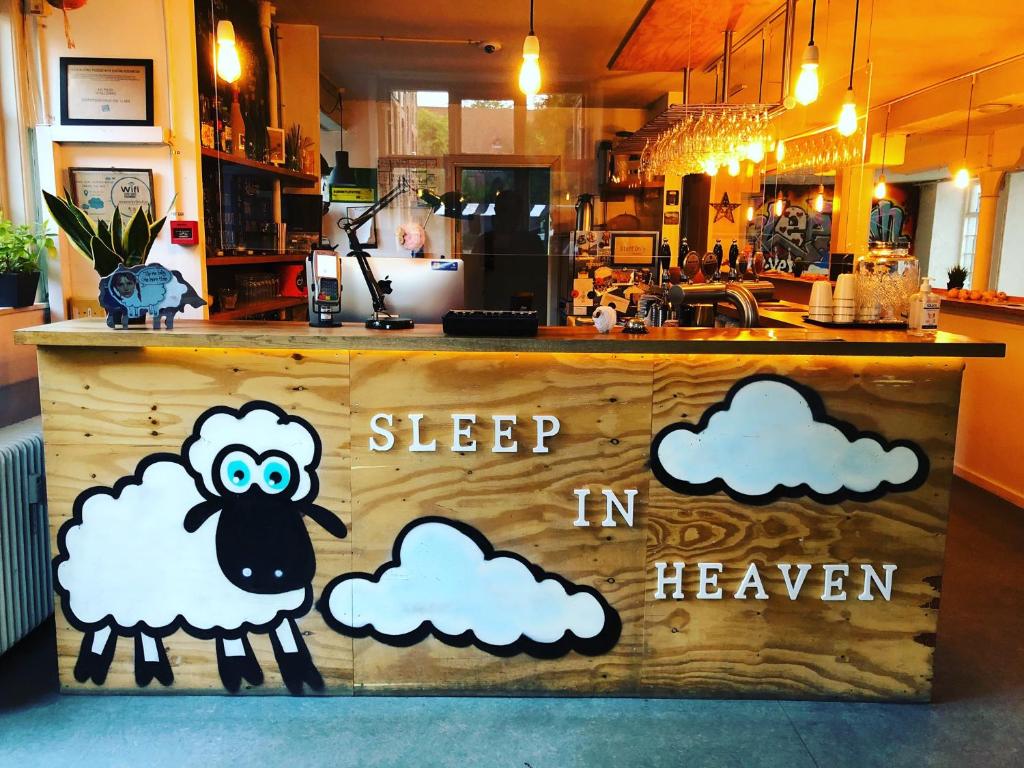 a sign that says sleep in heaven with a sheep at Sleep in Heaven in Copenhagen