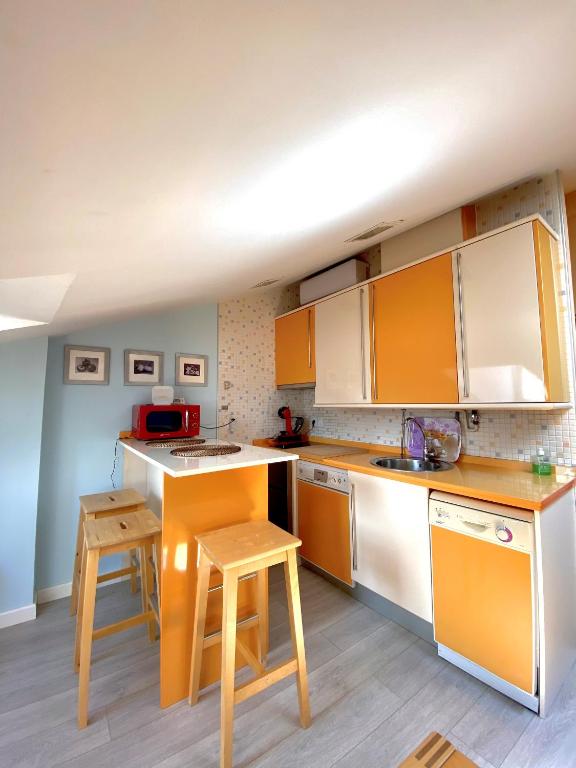 A kitchen or kitchenette at Apartamento Turistico Plaza Mayor