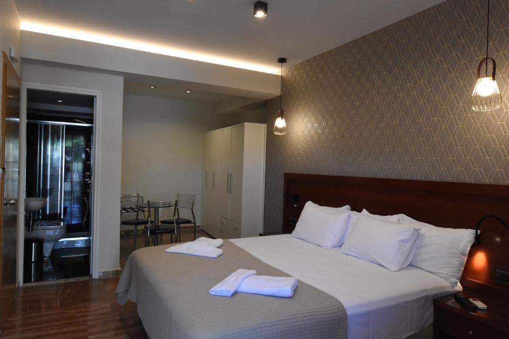 Posteľ alebo postele v izbe v ubytovaní Viaros Hotel Apartments