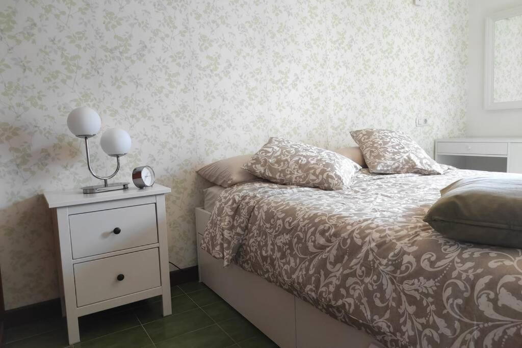 A bed or beds in a room at Apartamento BellAloe