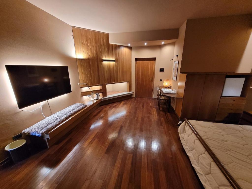 Postel nebo postele na pokoji v ubytování Nuovo Mondo