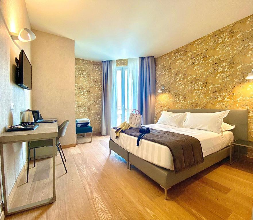 Postel nebo postele na pokoji v ubytování Hotel Medusa