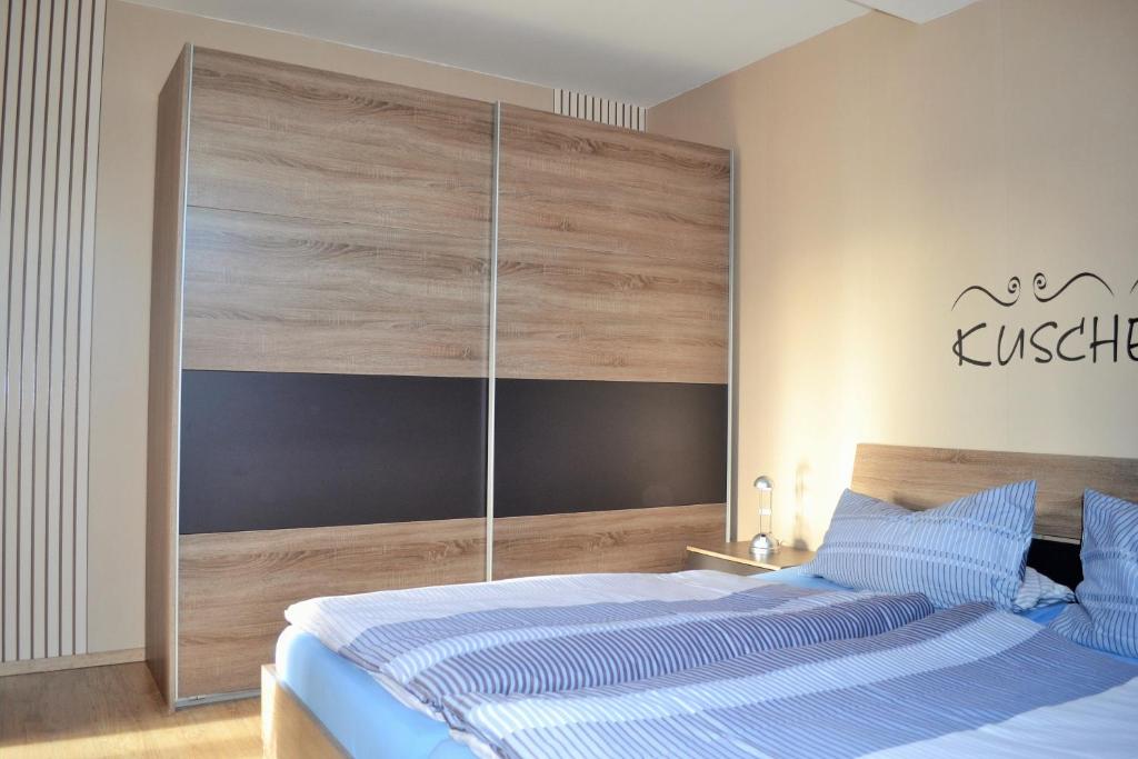 Postel nebo postele na pokoji v ubytování Gästehaus Klein