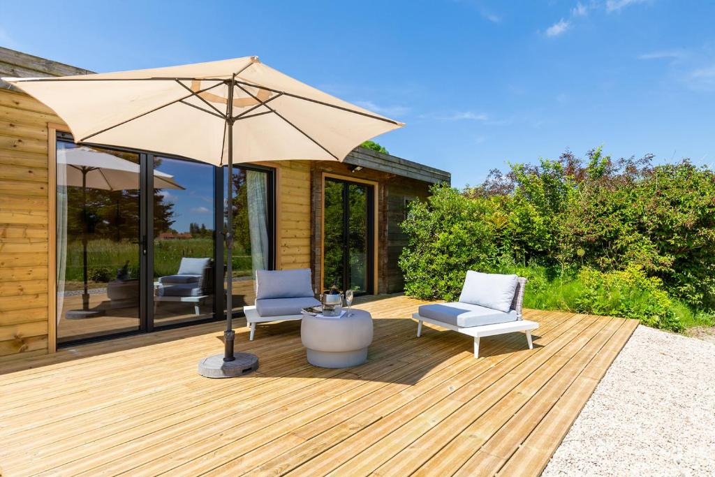Zahrada ubytování Les Lodges de Malbrough