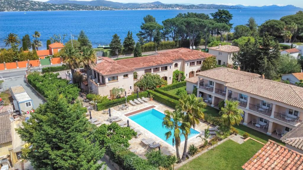 an aerial view of a house with a swimming pool at Hotel Brin d'Azur - Saint Tropez in Saint-Tropez