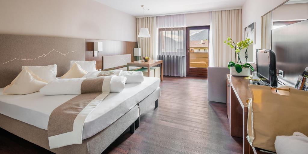 TV a/nebo společenská místnost v ubytování Christophs Hotel