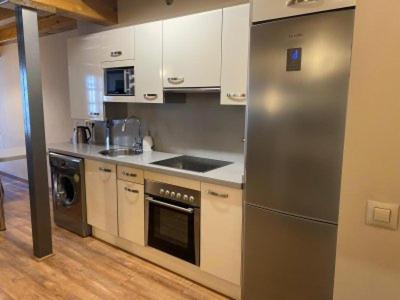 Dapur atau dapur kecil di Apartamentos Los Molinos