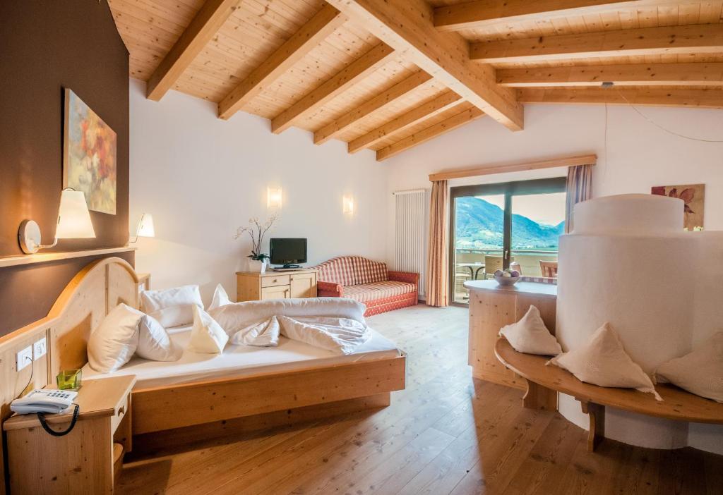 Postel nebo postele na pokoji v ubytování Christophs Hotel