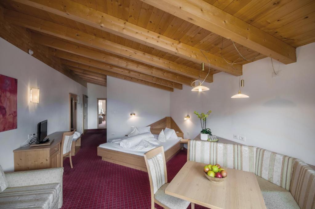 Postel nebo postele na pokoji v ubytování Christophs Hotel