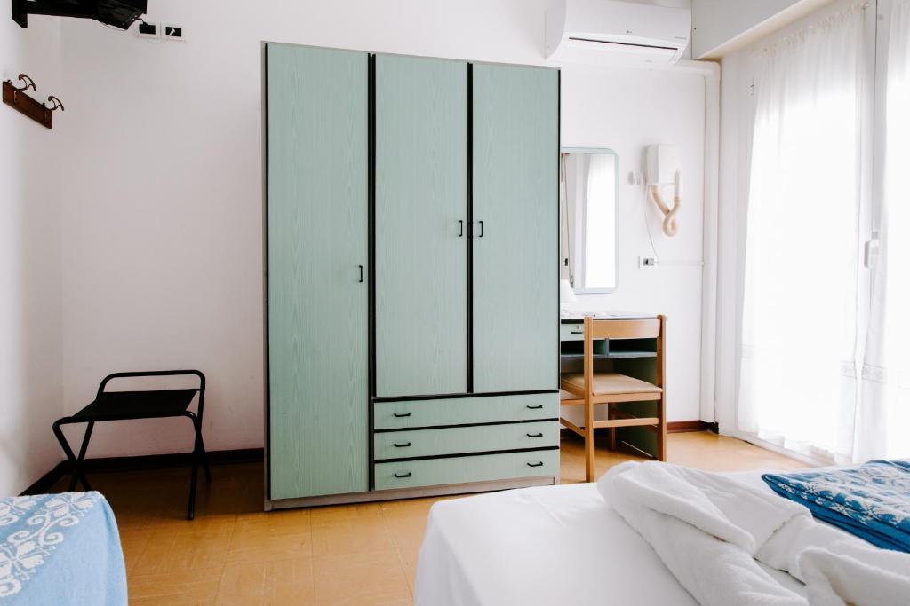 Postel nebo postele na pokoji v ubytování Hotel Edward