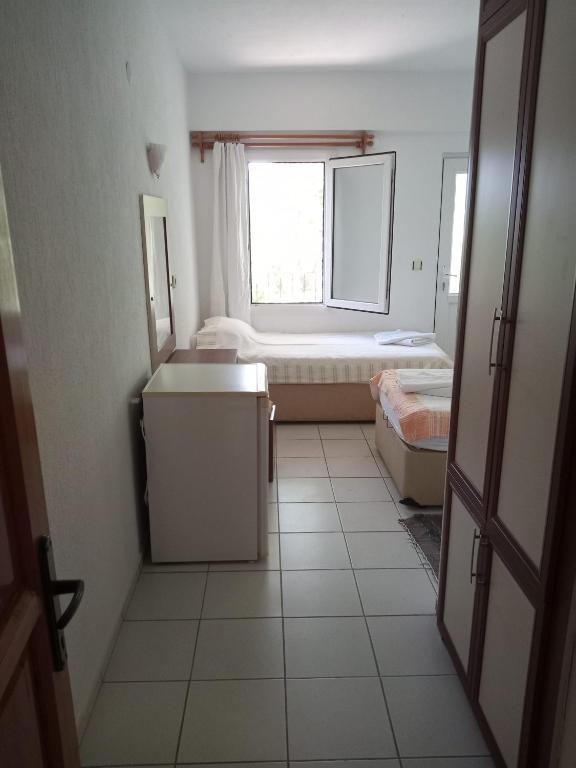 Postel nebo postele na pokoji v ubytování Makri Otel