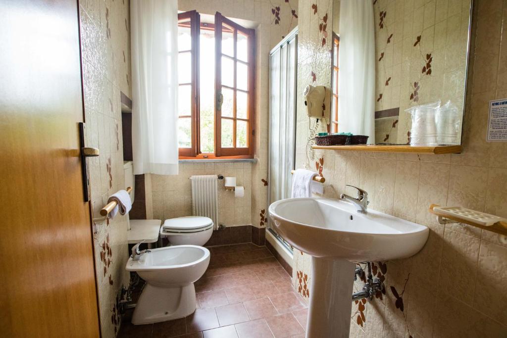 Koupelna v ubytování Hotel La Tavernetta dei Ronchi