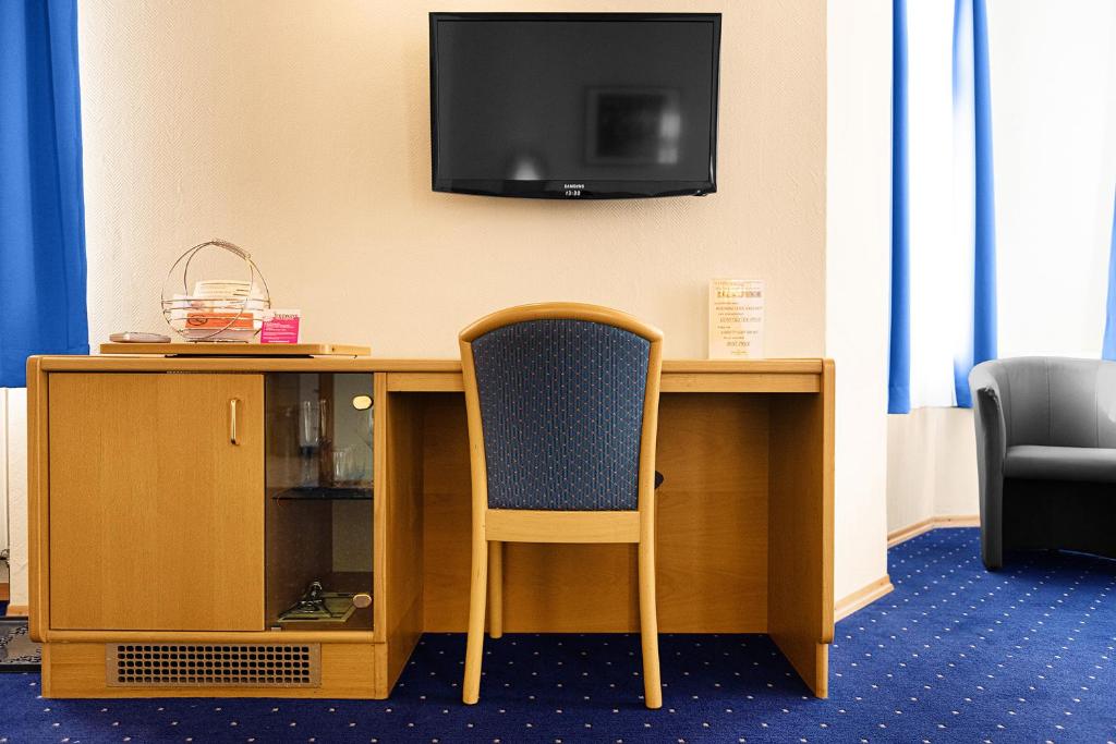 TV a/nebo společenská místnost v ubytování Hotel-Pension Wild