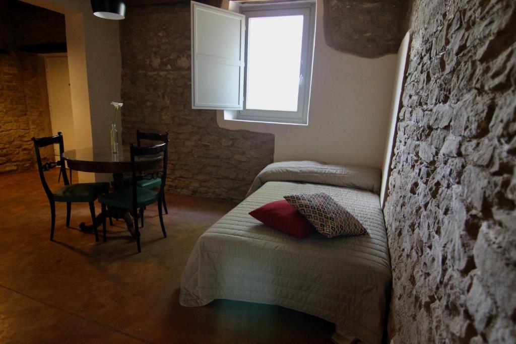 Postel nebo postele na pokoji v ubytování Relais Mevigo - Casa Pietra