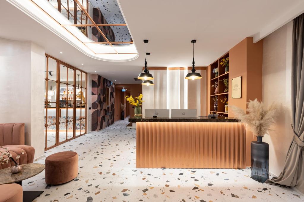 A seating area at Giulia Albérgo Hotel