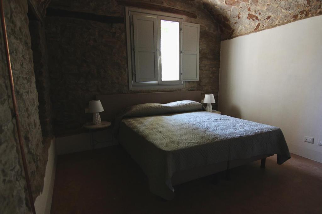Postel nebo postele na pokoji v ubytování Relais Mevigo - Casa Pietra