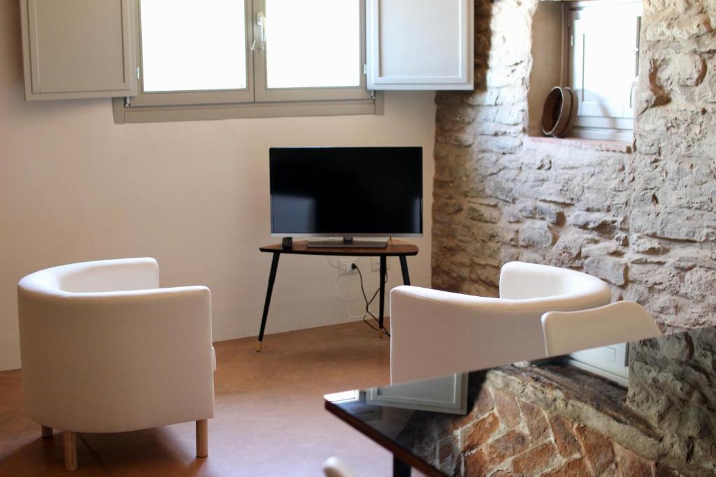 TV a/nebo společenská místnost v ubytování Relais Mevigo - Casa Pietra