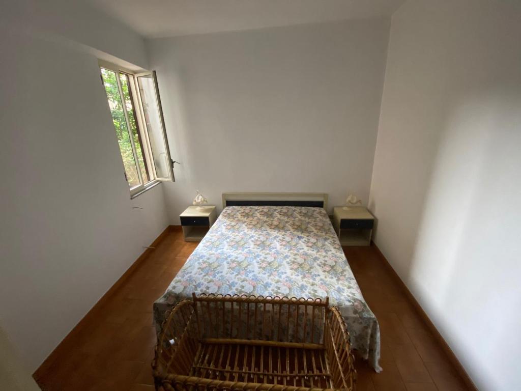 Łóżko lub łóżka w pokoju w obiekcie Appartamento mare e relax