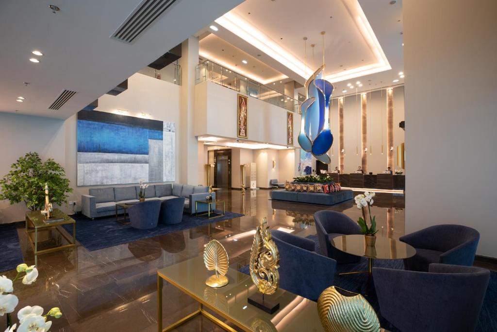 TV a/nebo společenská místnost v ubytování Centara West Bay Hotel & Residences Doha
