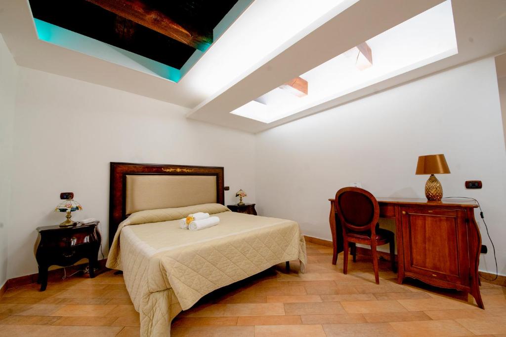 Postel nebo postele na pokoji v ubytování Hotel Lanfipe Palace