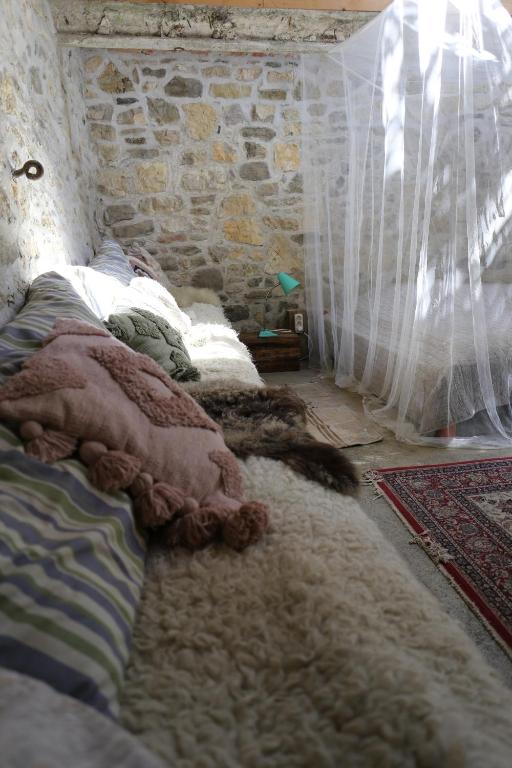 Posteľ alebo postele v izbe v ubytovaní Dejavu Ház