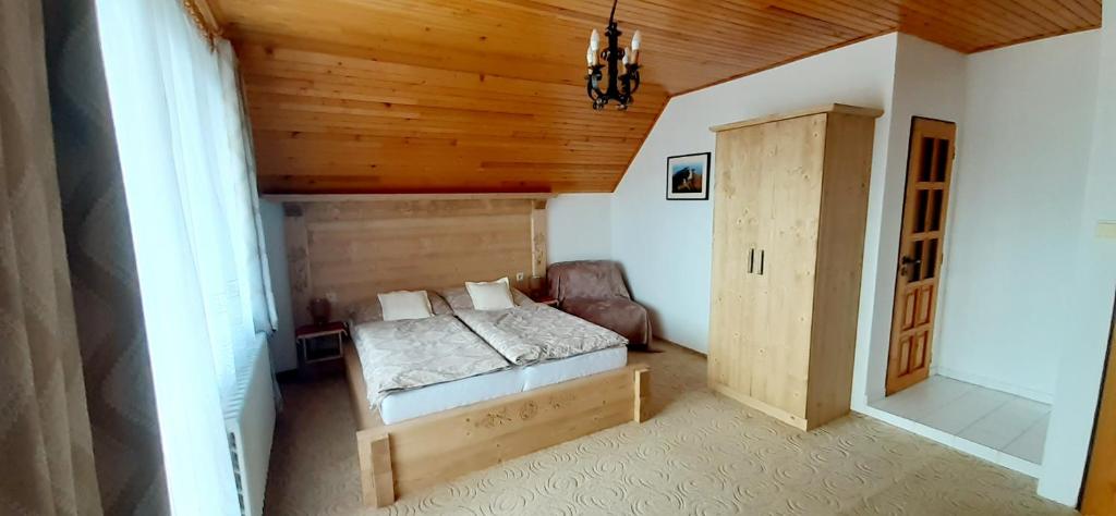 Postel nebo postele na pokoji v ubytování Apartmán Astra v Ždiari