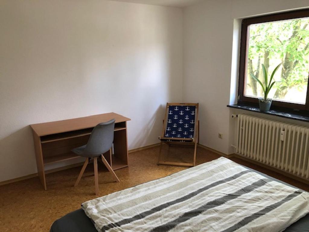 Postel nebo postele na pokoji v ubytování Haus Schwarzwaldblick