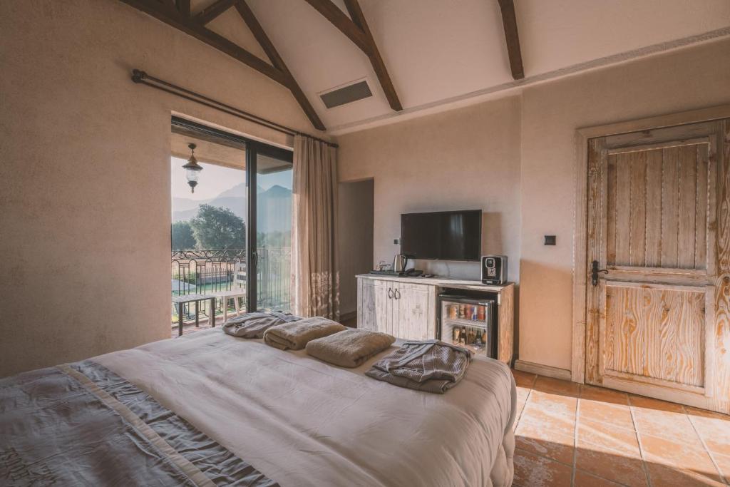 Postel nebo postele na pokoji v ubytování Turunç House Kayaköy