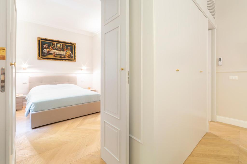 Posteľ alebo postele v izbe v ubytovaní Altafronte Enchanted Suite close to Uffizi Gallery