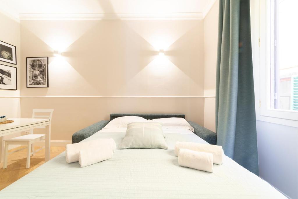 Posteľ alebo postele v izbe v ubytovaní Altafronte Enchanted Suite close to Uffizi Gallery
