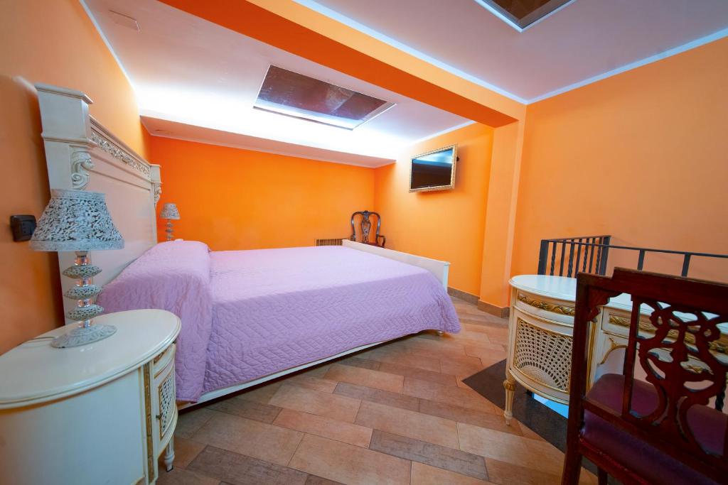 Postel nebo postele na pokoji v ubytování Hotel Lanfipe Palace