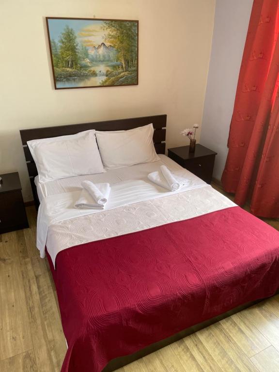 Postel nebo postele na pokoji v ubytování Softades Cottage