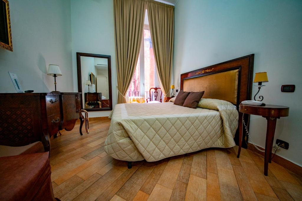 Postel nebo postele na pokoji v ubytování Hotel Lanfipe Palace