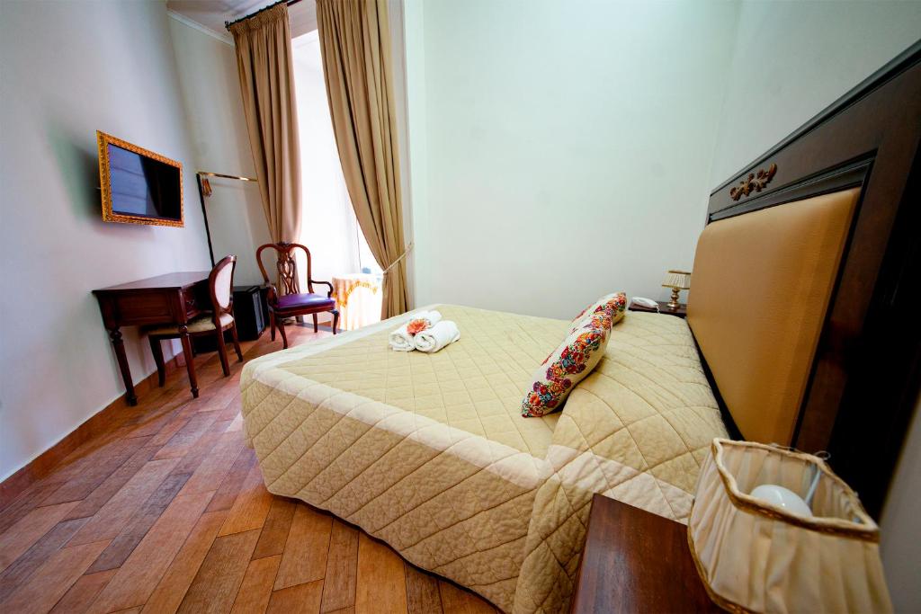 Postel nebo postele na pokoji v ubytování Hotel Lanfipe Palace