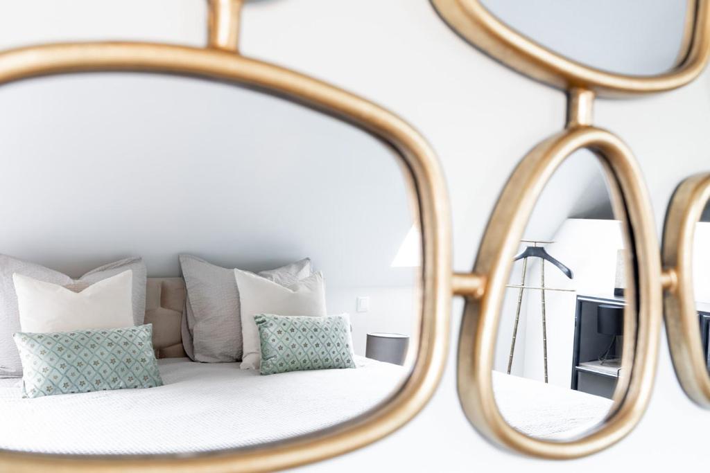 Postel nebo postele na pokoji v ubytování 99 Lifestyle Suite
