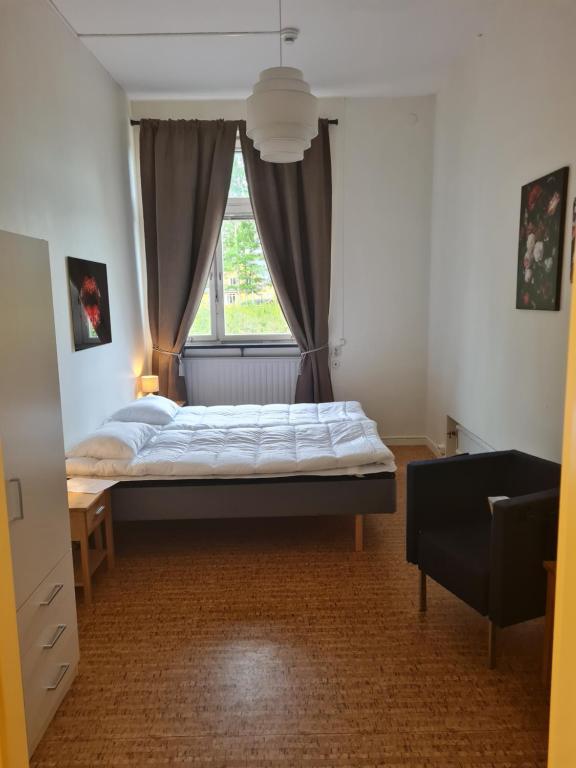 Postel nebo postele na pokoji v ubytování Dalasjö vandrarhem